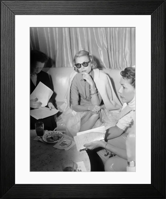 Framed Print : Grace Kelly Seated, Wearing Glasses Framed Print : Grace Kelly Seated, Wearing Glasses