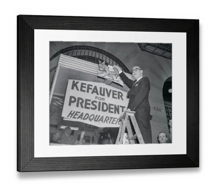 Framed Print : Estes Kefauver Decorating a Window Framed Print : Estes Kefauver Decorating a Window