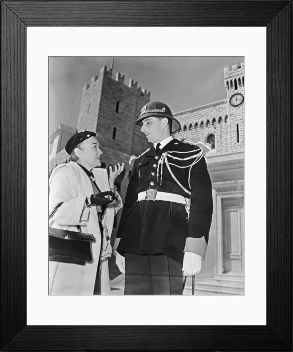 Framed Print : Portrait of Gloria Swanson with Police Officer