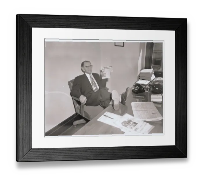 Framed Print : Man Holding News Clipping Framed Print : Man Holding News Clipping