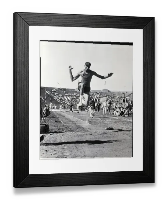Framed Print : Wilt Chamberlain in Mid Air Doing Long Jump Framed Print : Wilt Chamberlain in Mid Air Doing Long Jump