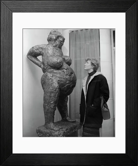 Framed Print : Lady Looking at Sculpture Framed Print : Lady Looking at Sculpture