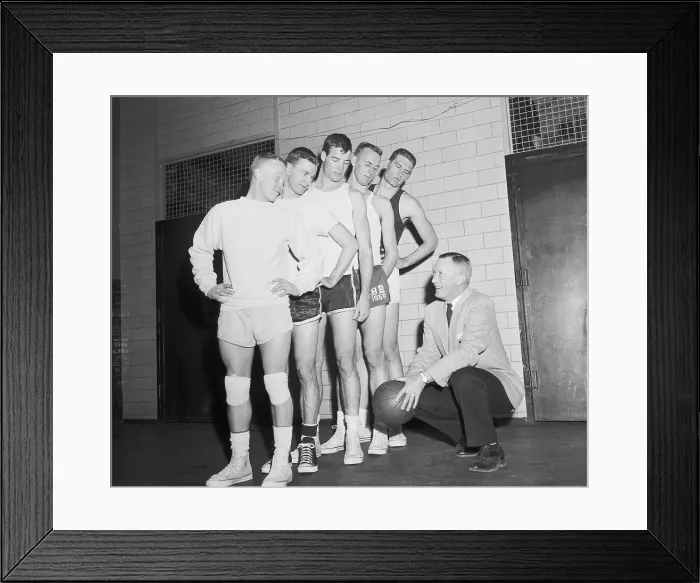 Framed Print : Basketball Players Standing Above Their Coach Framed Print : Basketball Players Standing Above Their Coach