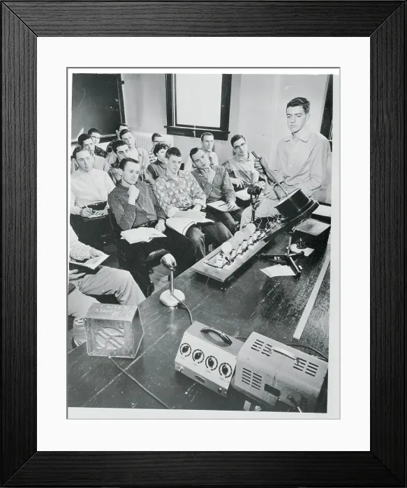 Framed Print : Teacher Conducts Course over Intercom Framed Print : Teacher Conducts Course over Intercom