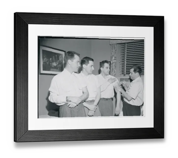 Framed Print : Doctor Administering an Injection Framed Print : Doctor Administering an Injection