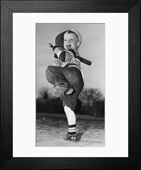 Framed Print : Boy With Bat, Cap On, Swinging Bat Framed Print : Boy With Bat, Cap On, Swinging Bat