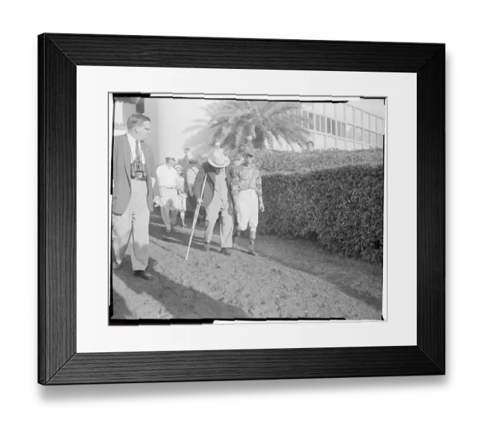 Framed Print : Eddie Arcaro and Sunny Jim Fitzsimmons Walking at Racetrack