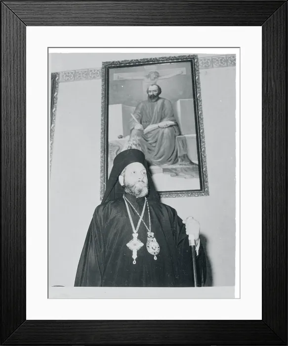 Framed Print : Bishop Photios Standing Beneath Portrait Framed Print : Bishop Photios Standing Beneath Portrait