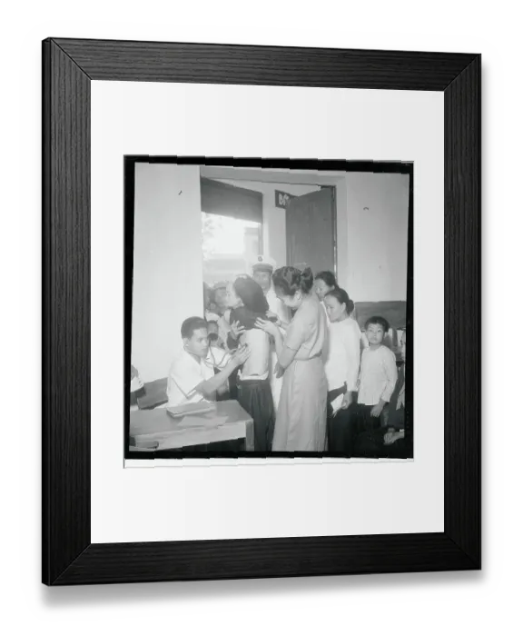 Framed Print : Doctor Examining a Patient Framed Print : Doctor Examining a Patient