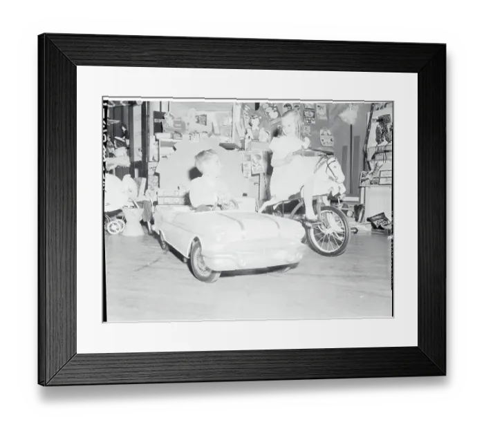 Framed Print : Children Riding Toys Framed Print : Children Riding Toys