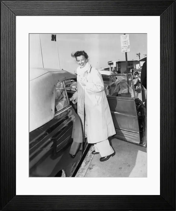 Framed Print : Katharine Hepburn Entering Car Framed Print : Katharine Hepburn Entering Car
