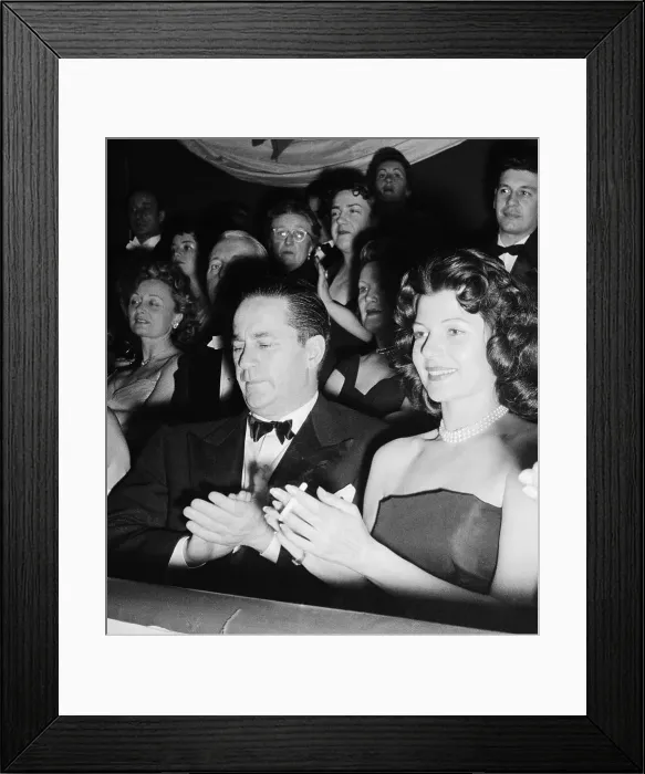 Framed Print : Rita Hayworth Applauding with Raymond Hakim Framed Print : Rita Hayworth Applauding with Raymond Hakim