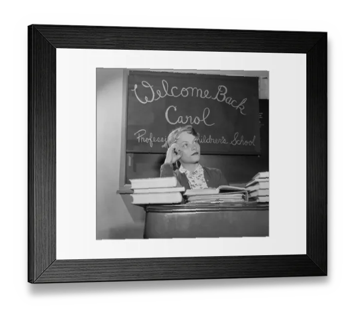 Framed Print : Carol Heiss Sitting at Desk With Books Framed Print : Carol Heiss Sitting at Desk With Books