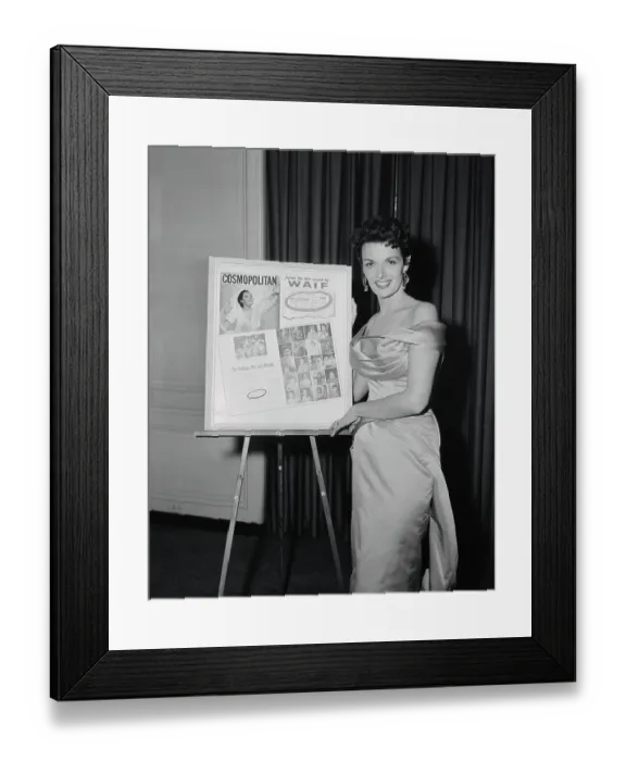 Framed Print : Jane Russell Standing Besides Magazine Poster Framed Print : Jane Russell Standing Besides Magazine Poster