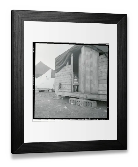 Framed Print : Mexican Child Peekingout of Hut
