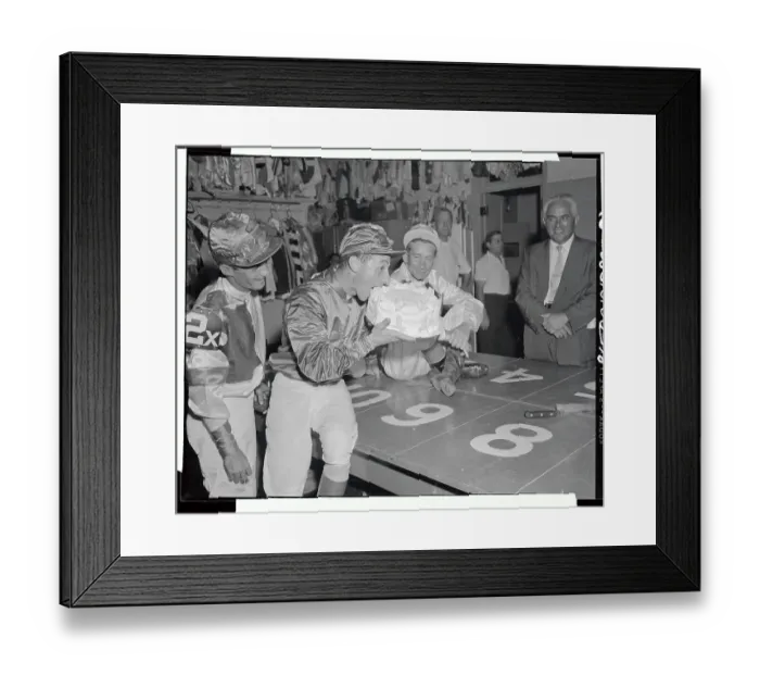 Framed Print : Eddie Arcaro Biting into Entire Birthday Cake Framed Print : Eddie Arcaro Biting into Entire Birthday Cake