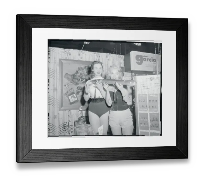 Framed Print : Young Ladies Holding Eel Lure for Bigger fish Framed Print : Young Ladies Holding Eel Lure for Bigger fish