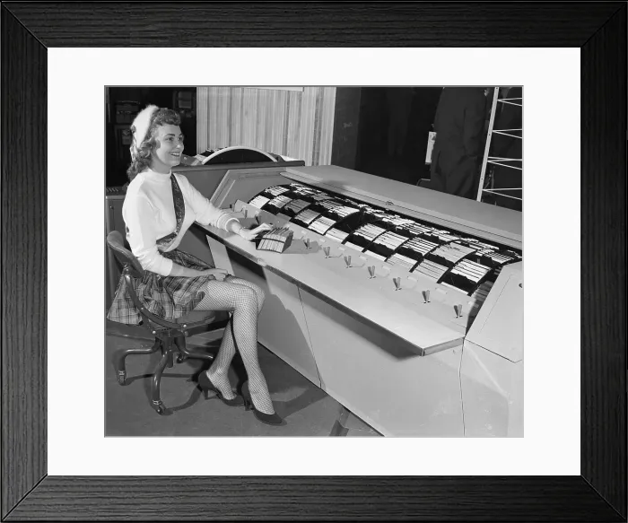 Framed Print : Charlene Petraus Sitting in Front of a Roto-File Framed Print : Charlene Petraus Sitting in Front of a Roto-File
