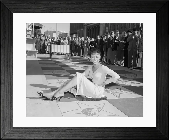 Framed Print : Rita Moreno Seated on Hollywood Sidewalk Framed Print : Rita Moreno Seated on Hollywood Sidewalk