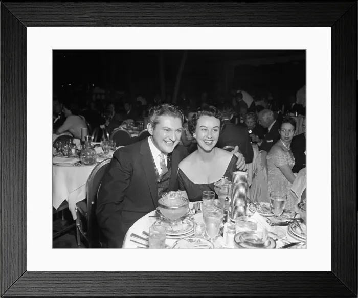 Framed Print : Liberace. Pianist Liberace and Actress Margaret Lindsay enjoy an evening Framed Print : Liberace. Pianist Liberace and Actress Margaret Lindsay enjoy an evening