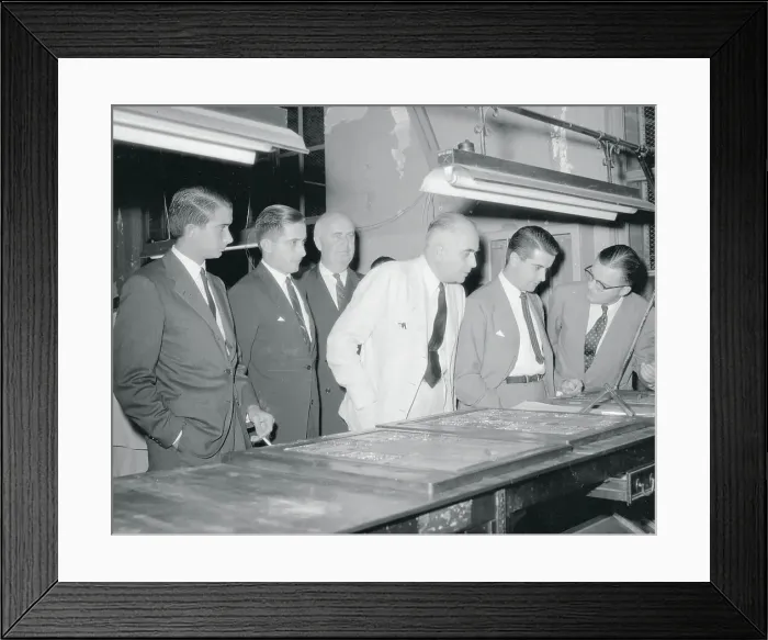 Framed Print : Frank Bartholomew and Colleagues Looking at Newspaper Plates Framed Print : Frank Bartholomew and Colleagues Looking at Newspaper Plates