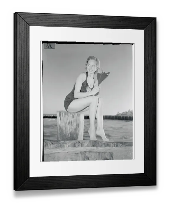 Framed Print : Marcia Valibus Posing with Model of Navy Cougar Plane Framed Print : Marcia Valibus Posing with Model of Navy Cougar Plane