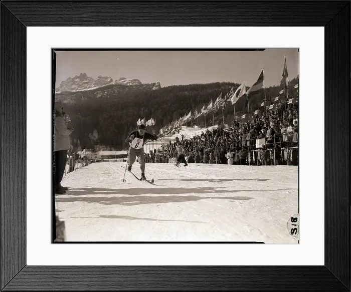 Framed Print : Cross Country Skier Crosses Finish Line Framed Print : Cross Country Skier Crosses Finish Line