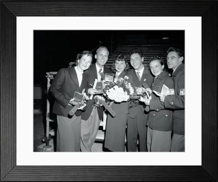 Framed Print : Olympic Pair Figure Skaters Holding Their Medals