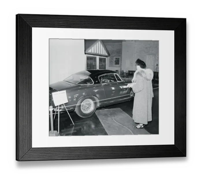 Framed Print : Woman Admiring a New Ferrari Framed Print : Woman Admiring a New Ferrari