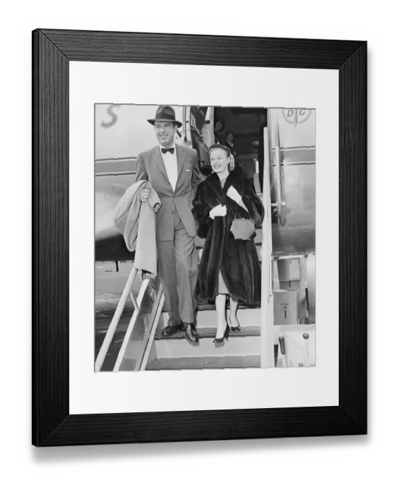 Framed Print : Fred MacMurray and Wife June Haver Leaving Airplane Framed Print : Fred MacMurray and Wife June Haver Leaving Airplane