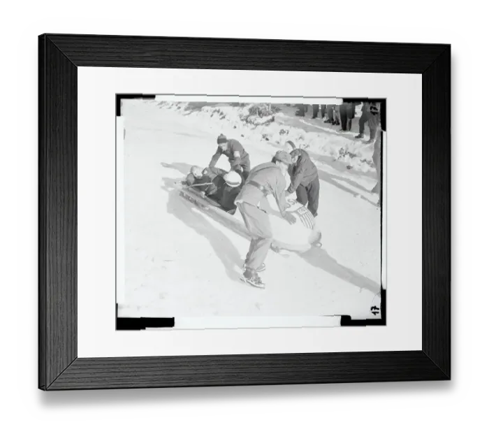 Framed Print : Policeman Helping Edgar Seymour Out of a Bobsled Framed Print : Policeman Helping Edgar Seymour Out of a Bobsled