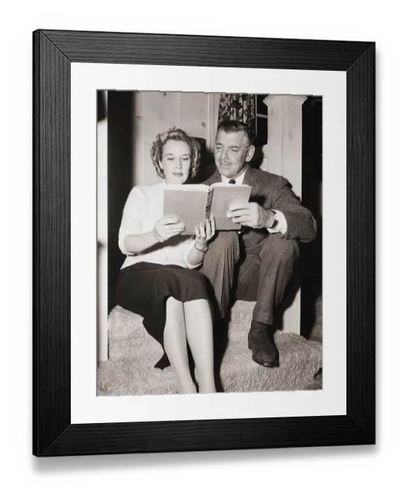 Framed Print : Clark and Kay Gable Sit Reading Book Framed Print : Clark and Kay Gable Sit Reading Book
