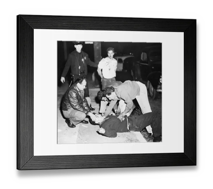 Framed Print : People Helping an Injured Man