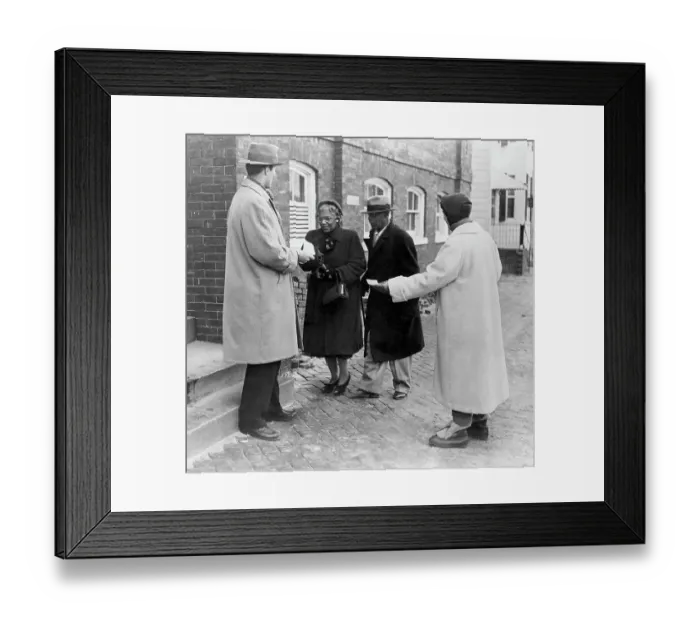 Framed Print : Pamphleteers Approaching Elderly Couple Framed Print : Pamphleteers Approaching Elderly Couple