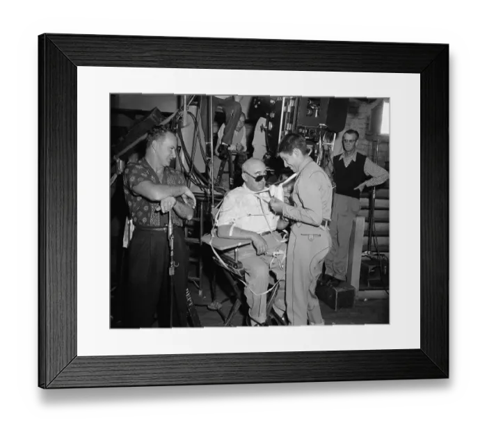 Framed Print : Jerry Lewis Taping Norman Taurog to His Chair