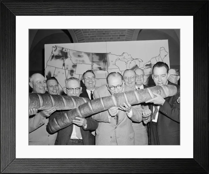 Framed Print : Wheat Farmers Holding Bread Framed Print : Wheat Farmers Holding Bread