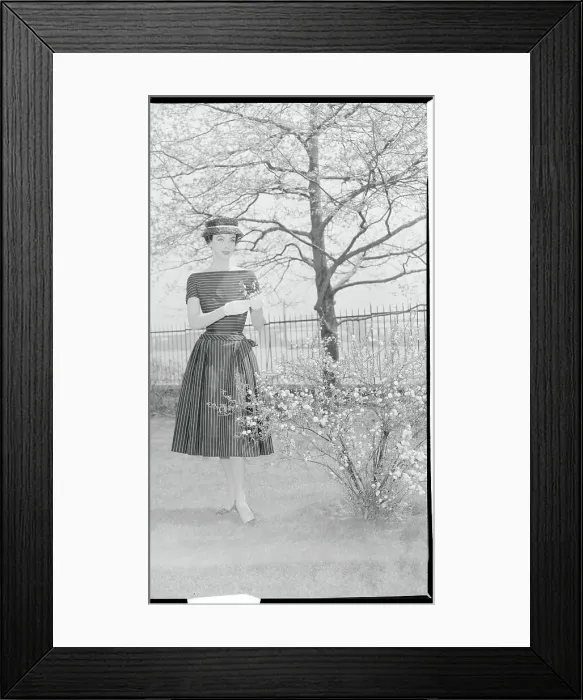 Framed Print : Woman Modeling an Afternoon Dress Framed Print : Woman Modeling an Afternoon Dress