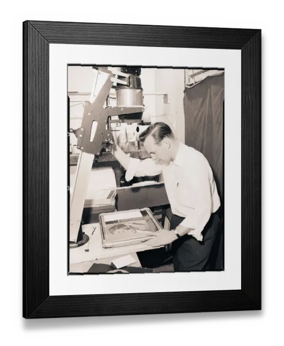 Framed Print : Man Printing a Negative Framed Print : Man Printing a Negative