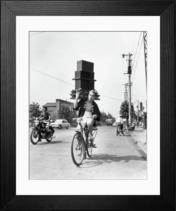 Framed Print : Boy On Bicycle Carrying Lots Of Noodles Framed Print : Boy On Bicycle Carrying Lots Of Noodles