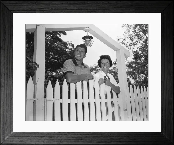 Framed Print : Ronald and Nancy Reagan Standing Behind Fence Framed Print : Ronald and Nancy Reagan Standing Behind Fence