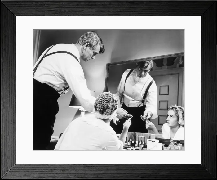 Framed Print : Elizabeth Taylor and Rock Hudson in Bedroom Scene Framed Print : Elizabeth Taylor and Rock Hudson in Bedroom Scene