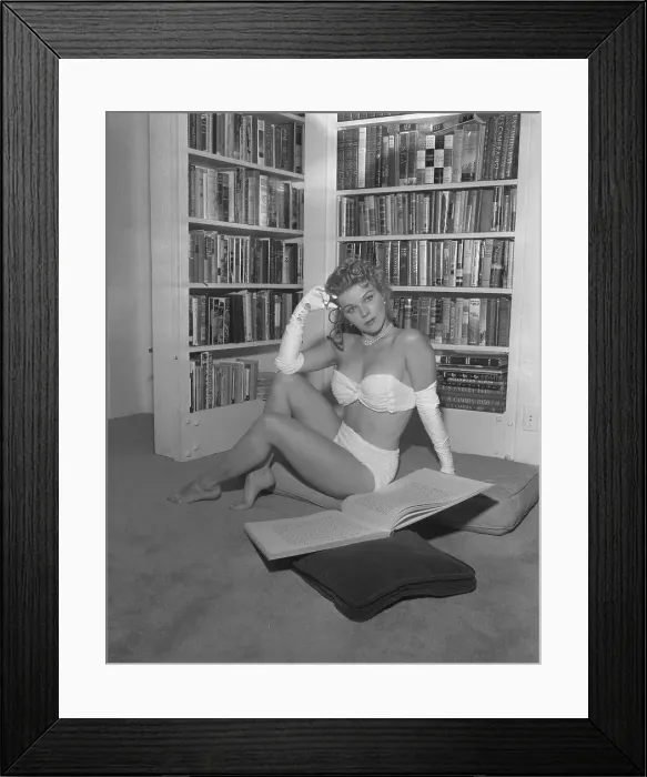 Framed Print : Actress Sally Forrest Posing on Floor Near Bookshelf Framed Print : Actress Sally Forrest Posing on Floor Near Bookshelf