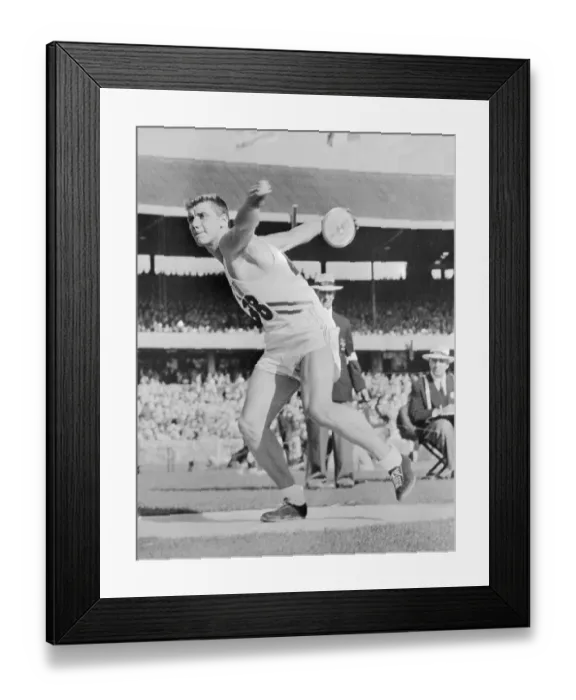Framed Print : Al Oerter in Position to Throw Discus