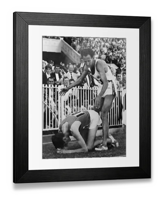 Framed Print : Track Star Standing over Opponent at Finish Line Framed Print : Track Star Standing over Opponent at Finish Line