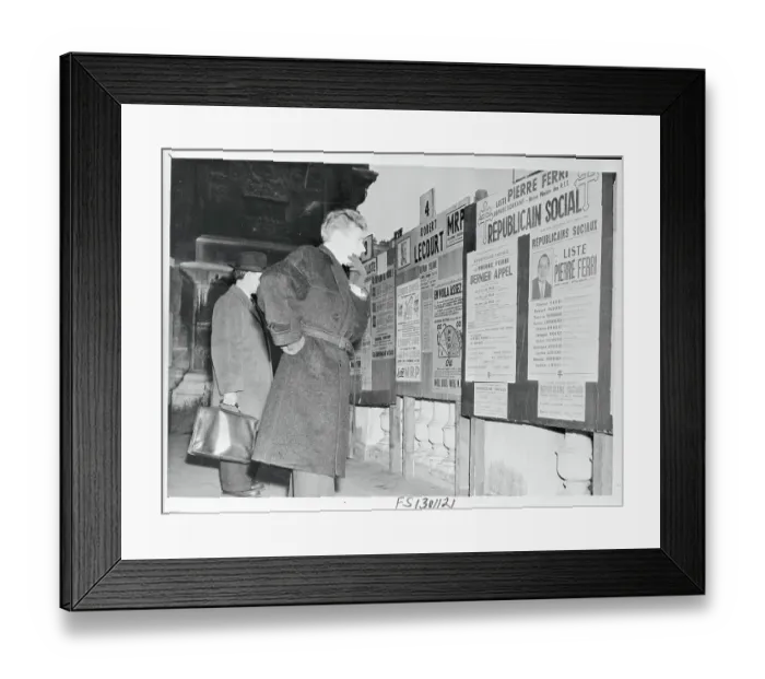 Framed Print : French Voter Reading Election Posters Framed Print : French Voter Reading Election Posters
