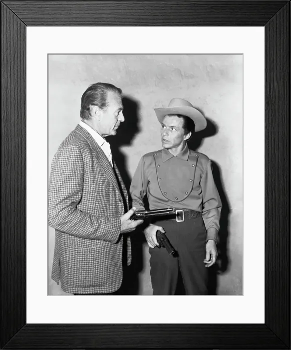 Framed Print : Gary Cooper Showing Frank Sinatra How to Use a Gun