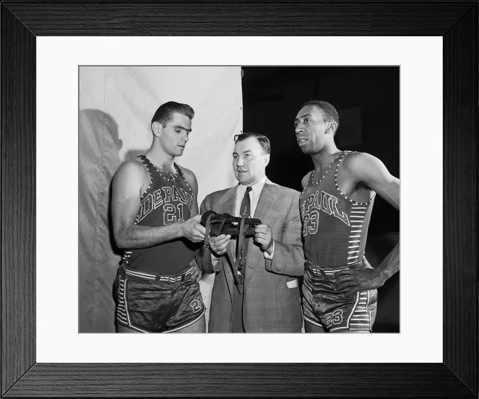 Framed Print : Coach Ray Meyer Holding Iron Shoe for Athletes Framed Print : Coach Ray Meyer Holding Iron Shoe for Athletes