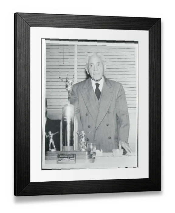 Framed Print : Alonzo Stagg Standing Near Large Trophy Framed Print : Alonzo Stagg Standing Near Large Trophy