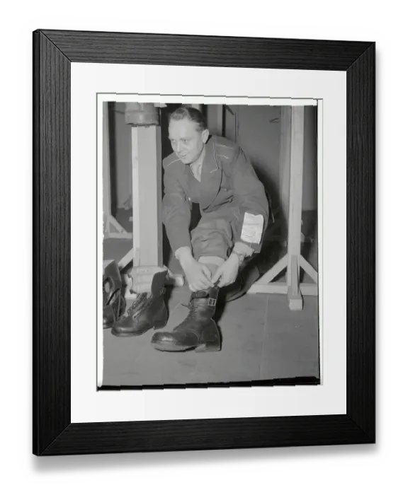 Framed Print : Infantryman Trying on Boots Framed Print : Infantryman Trying on Boots