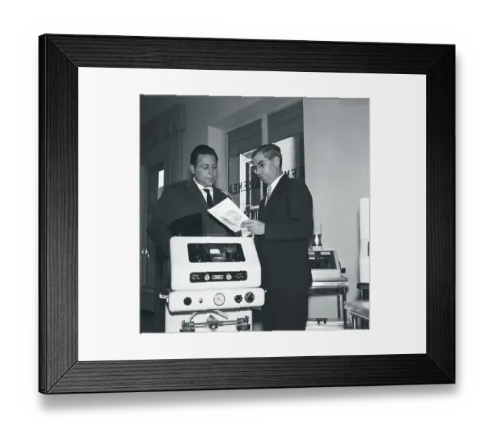 Framed Print : Lucky Luciano Pitching Medical Equipment to Customer
